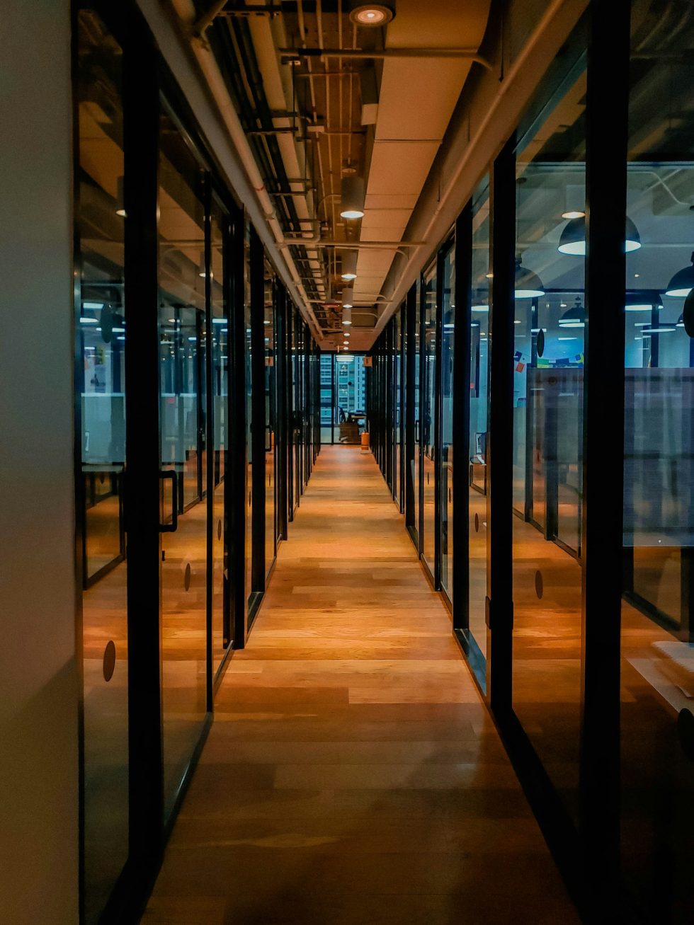 Photo of an office corridor, inspired by eb-Qual, a Swiss cybersecurity expert securing ICT infrastructures with tailored and certified solutions